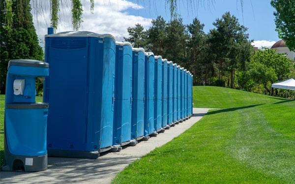 Portable restroom units paired for events needing extra hygiene capacity